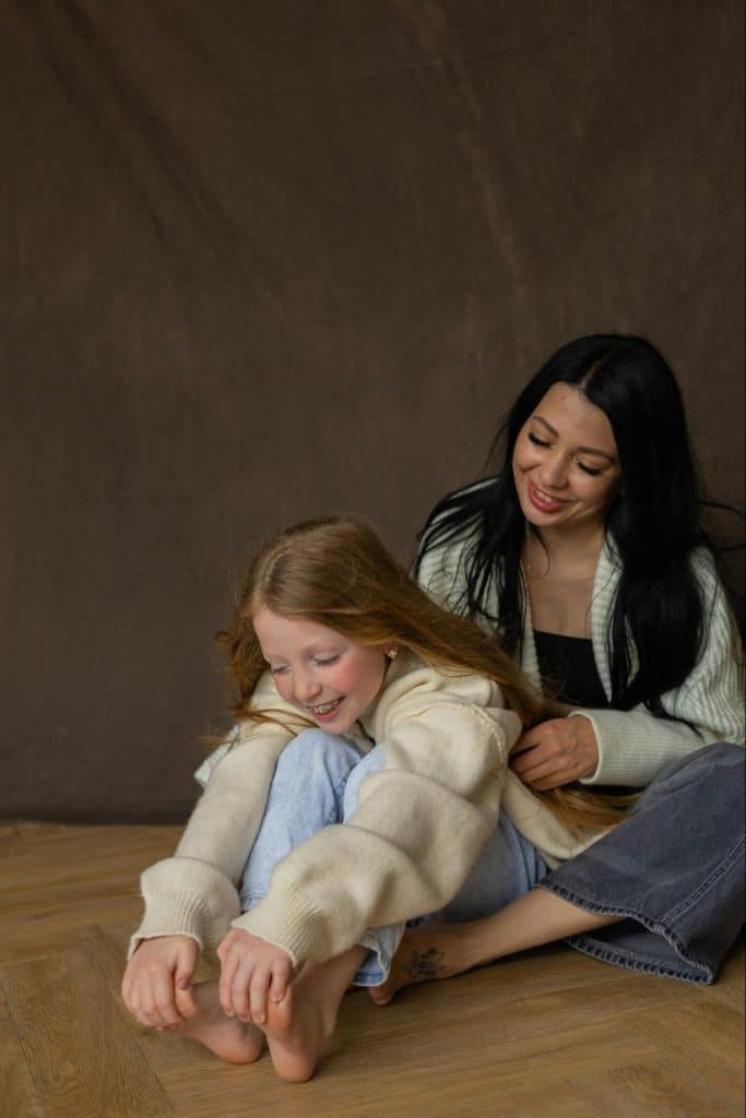 Caregiver providing childcare support during a calm moment at home